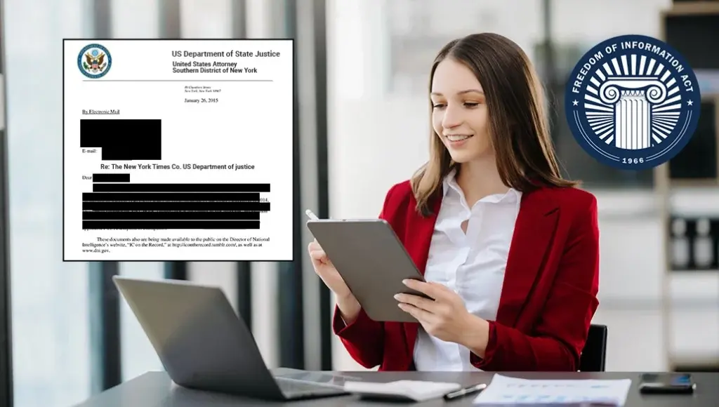 A records officer redacting government document for FOIA request