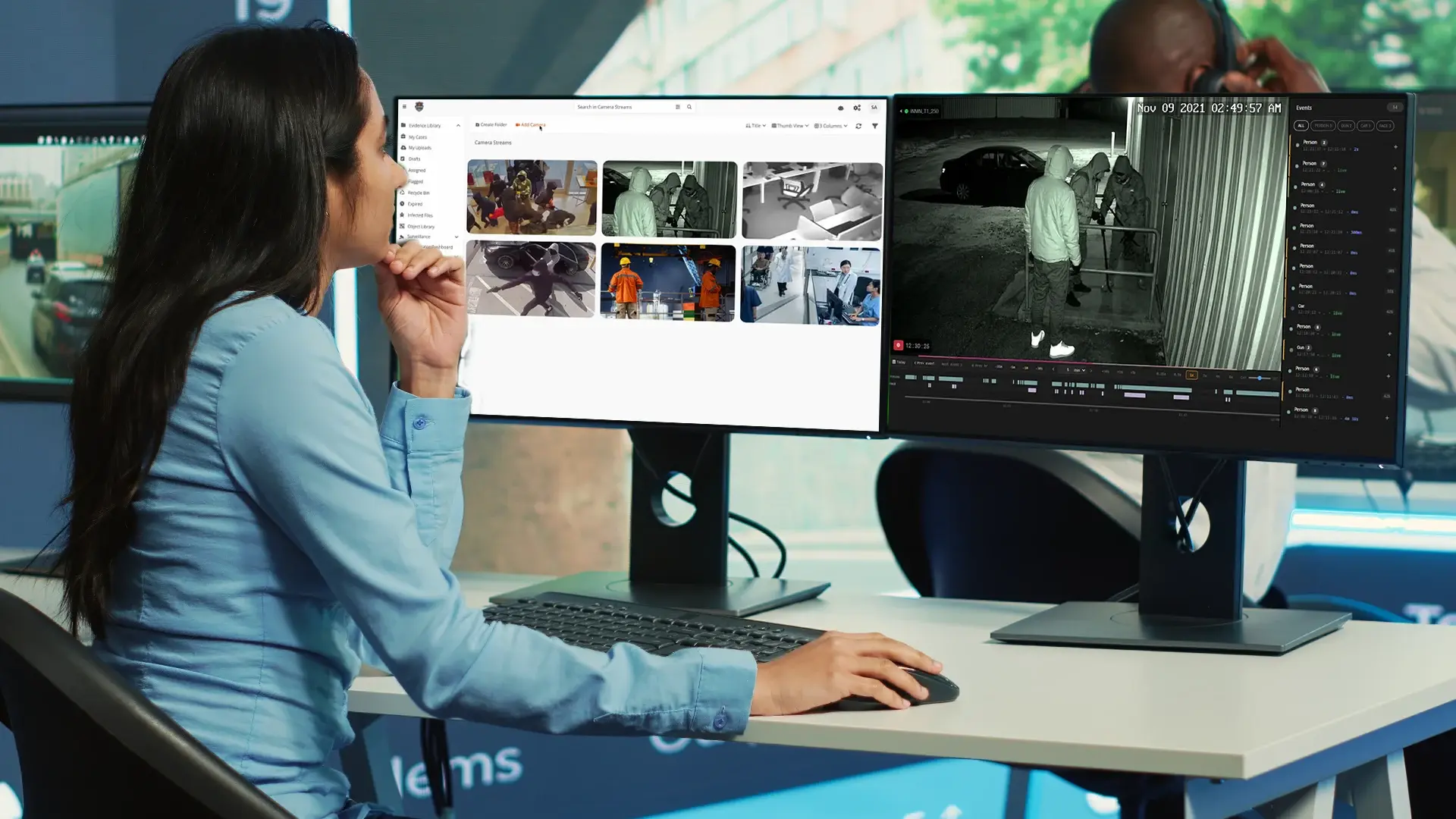 An analyst reviewing video footage on a monitor with a redaction panel open