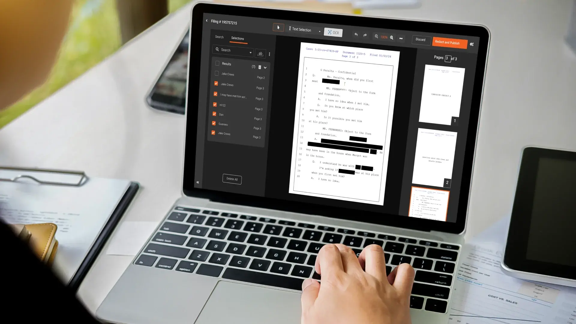 A person using a laptop to redact medical sensitive data