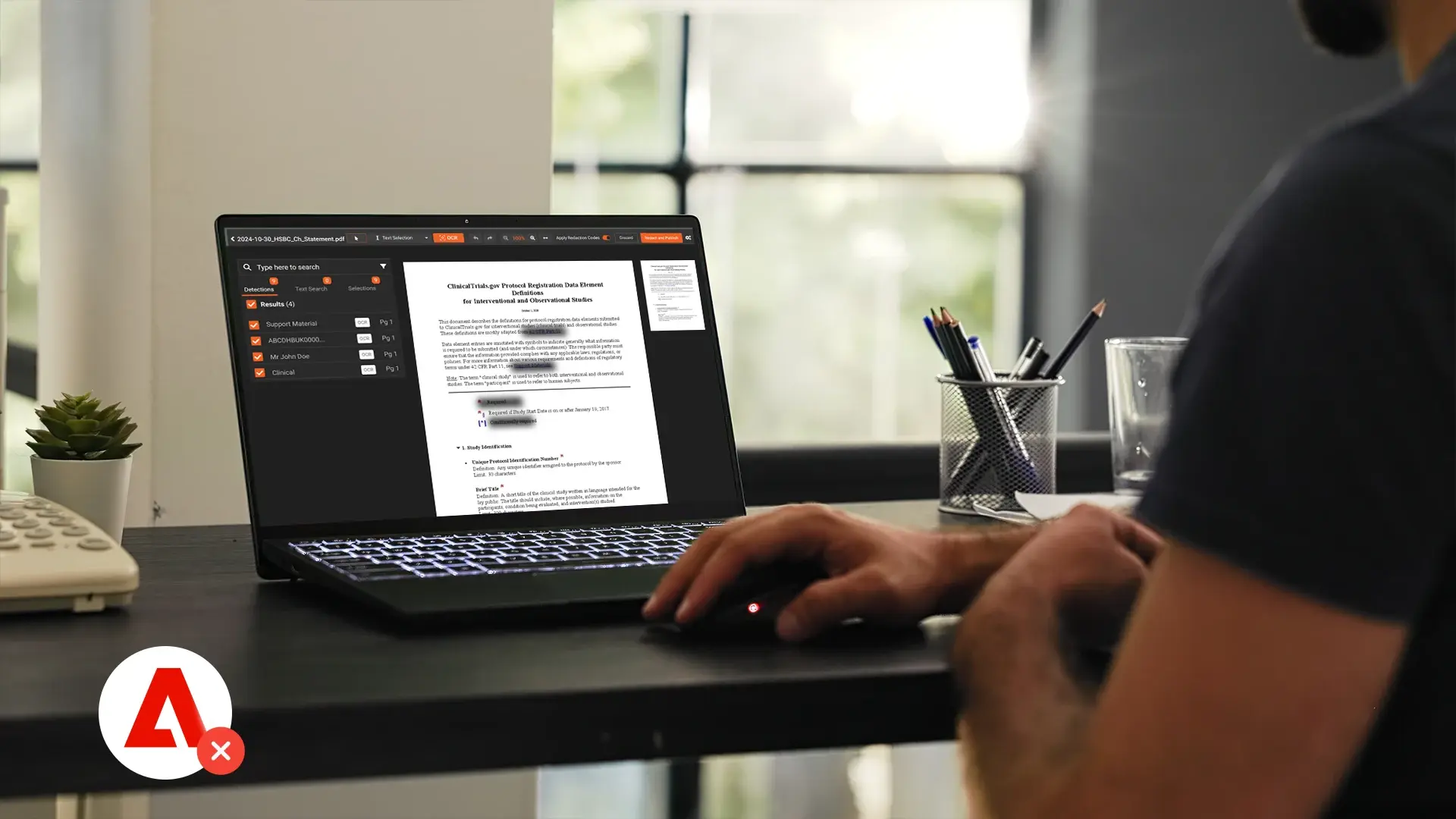 a person using redactor for redacting documents